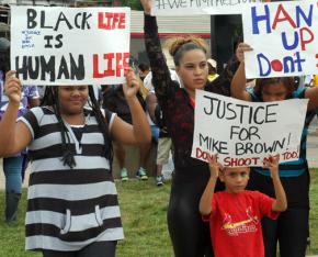 Young people in Ferguson protest the police murder of Mike Brown