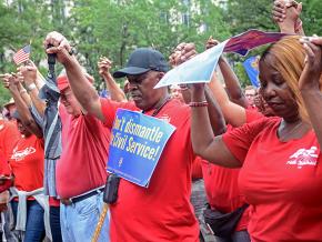 AFGE members go #RedForFeds in Washington, D.C., to protest Trump’s union-busting.